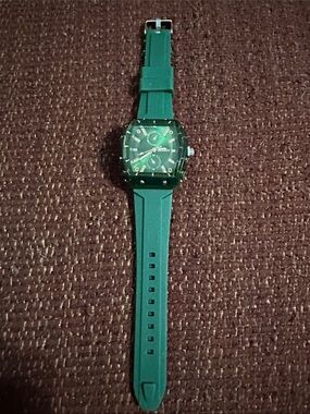 Green Silicone Men's Watch - with gold accents.